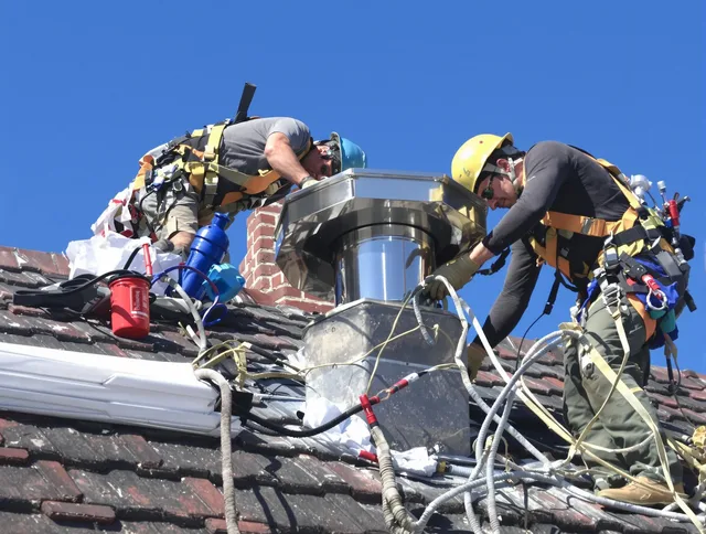 Protective chimney cap installed by Somers Chimney Sweep in Somers, CT