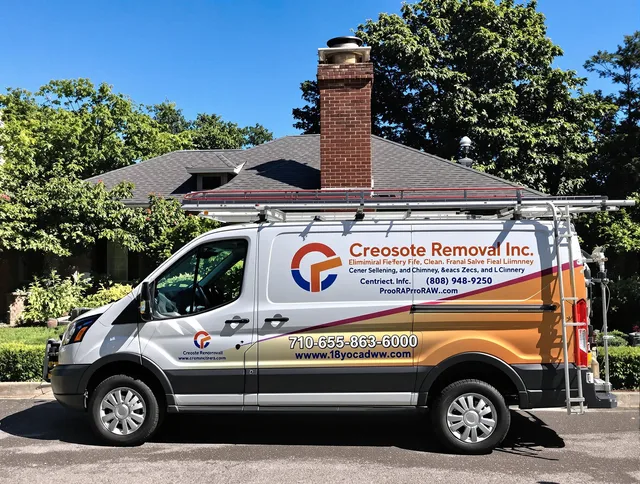 Somers Chimney Sweep technician removing creosote safely in Somers, CT